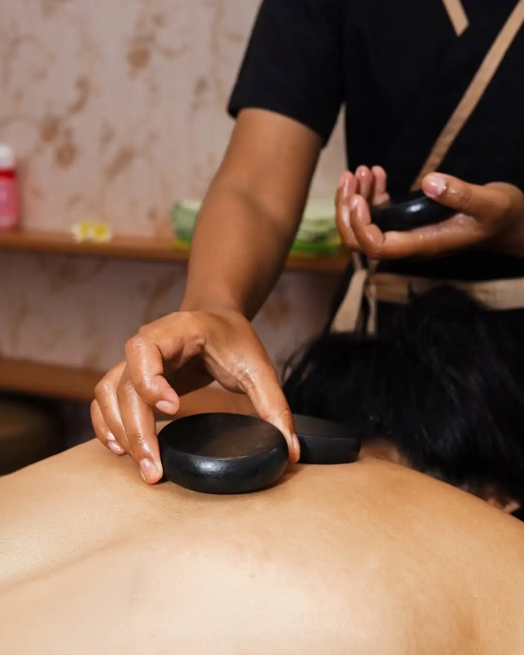 Professional hot stone massage treatment at MY SPA LOMBOK in Kuta Mandalika